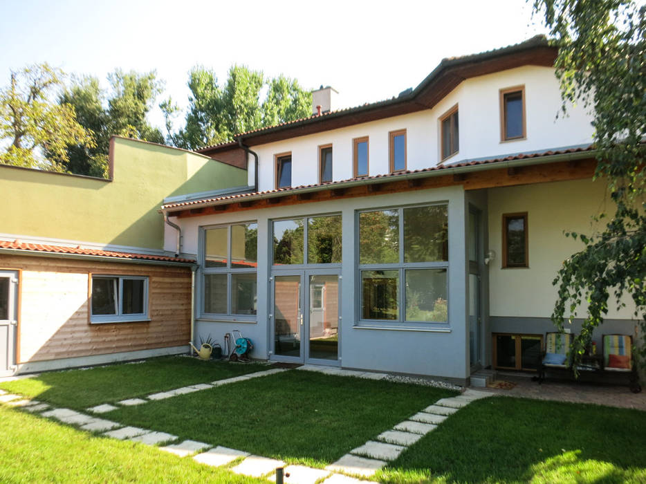 Zubauten Haus Wallner, archipur Architekten aus Wien archipur Architekten aus Wien Modern conservatory Bricks