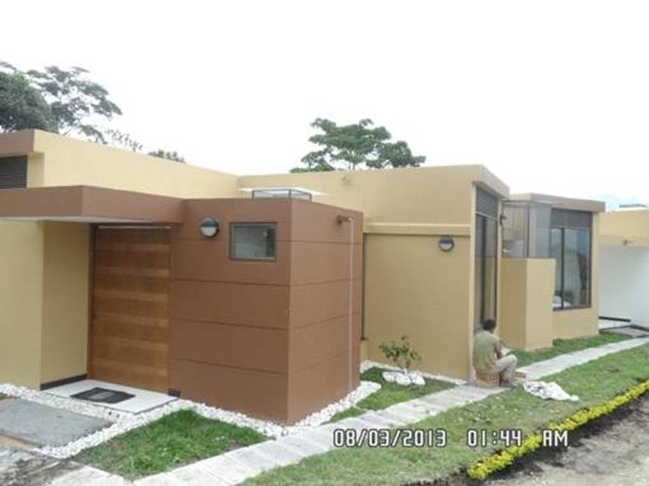 Fachada NetCom Construcciones Casas de campo