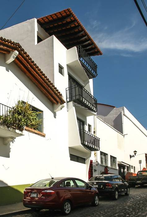 Loft de la escalera espiral roja, arqflores / architect arqflores / architect Single family home