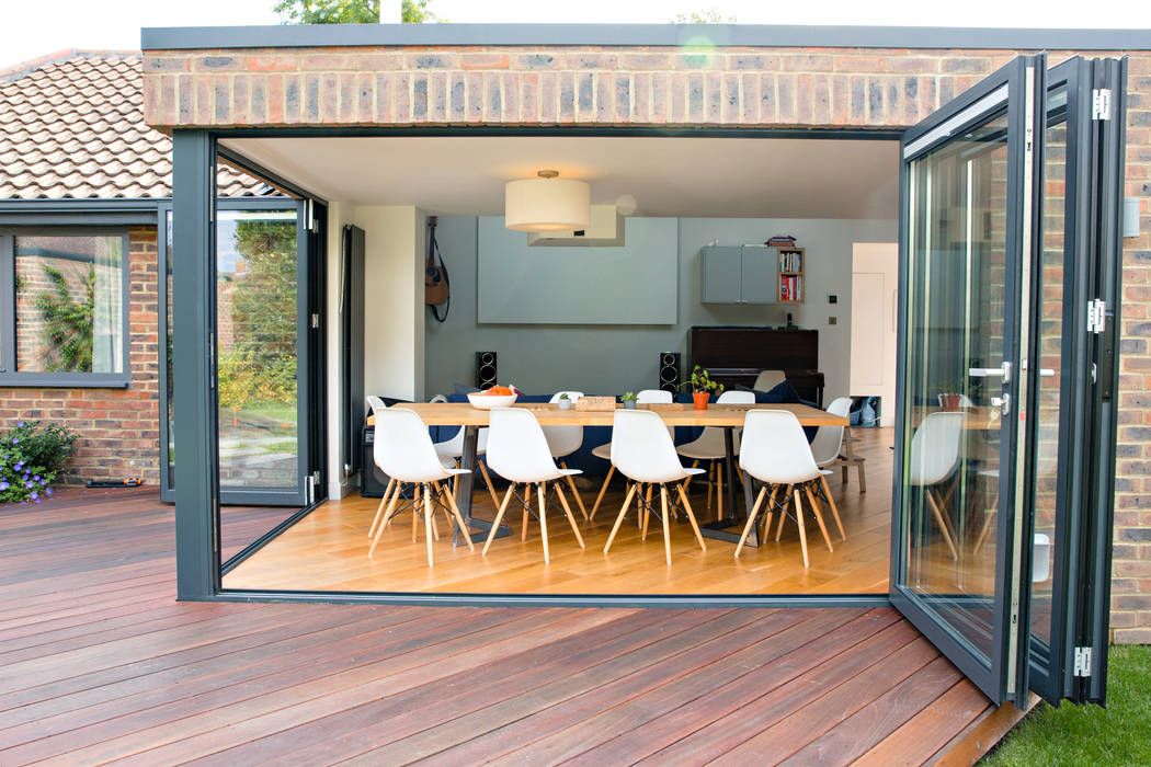 Exterior view of extension and bi-foldng doors dwell design Rumah Modern