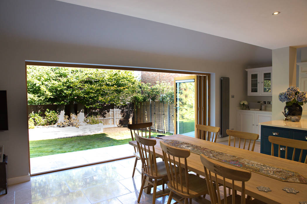 View of dining space and bi-folding doors dwell design Modern dining room