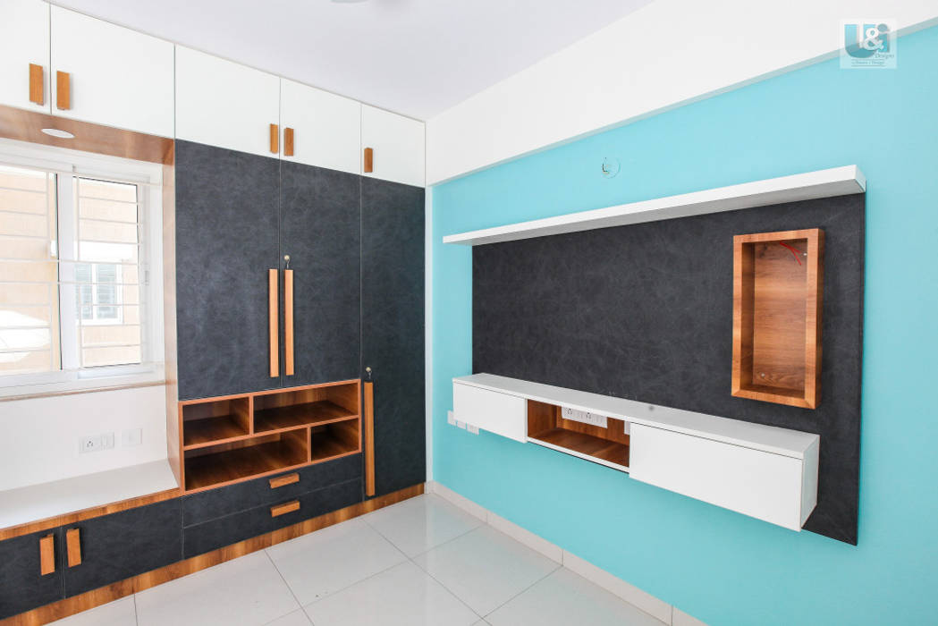 Wardrobe & tv unit in the master bedroom homify