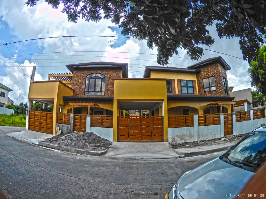 Two Storey Residences at Rosario Cavite, MG Architecture Design Studio MG Architecture Design Studio Casas multifamiliares Concreto