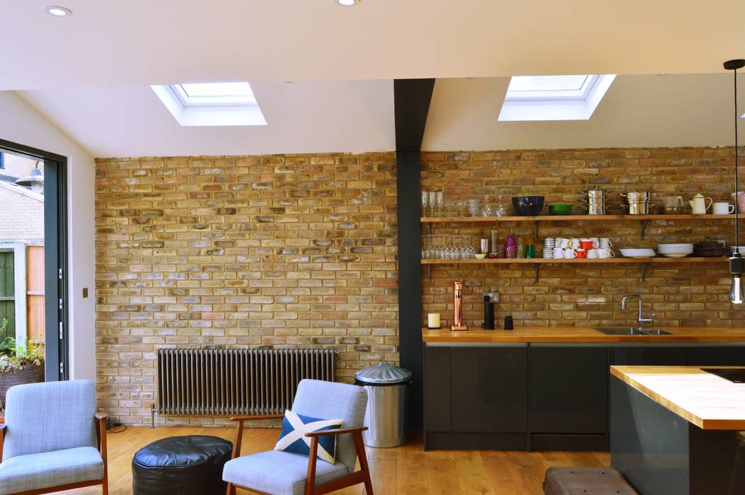 Architect designed house extension Maryland Newham E15 - Internal brick wall GOAStudio London residential architecture limited Kitchen units