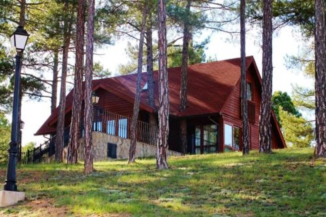 Cabañas - Bungalow para camping en Cuenca homify Techos a cuatro aguas