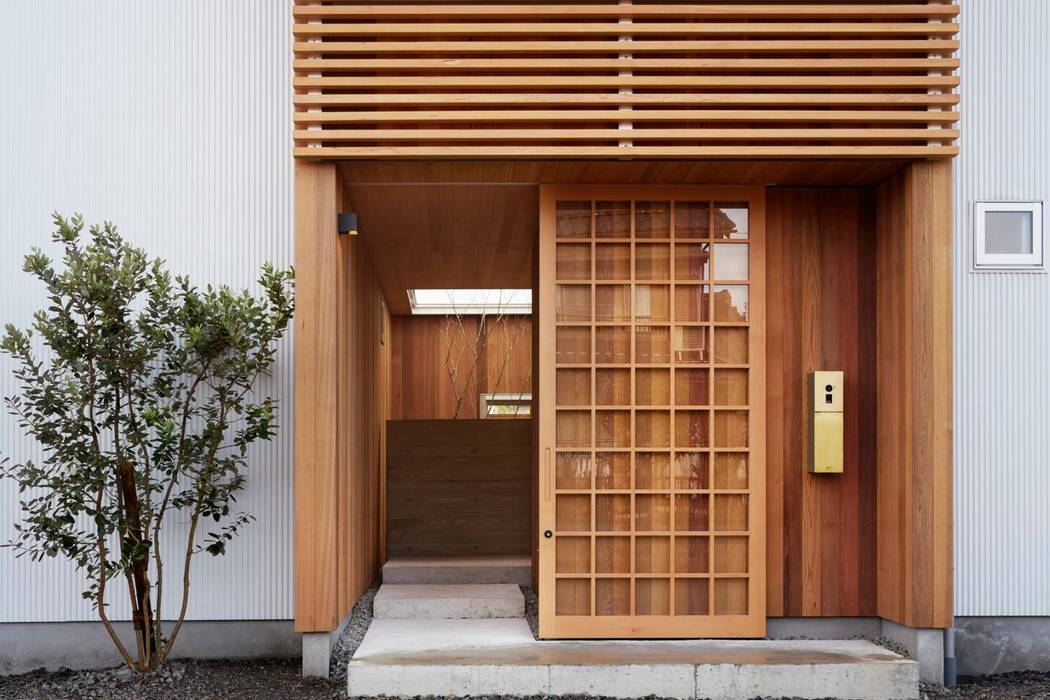 ひるいのいえ〜 様々な部屋から見える 坪庭 住宅〜, ツジデザイン一級建築士事務所 ツジデザイン一級建築士事務所 Wooden houses Wood Wood effect