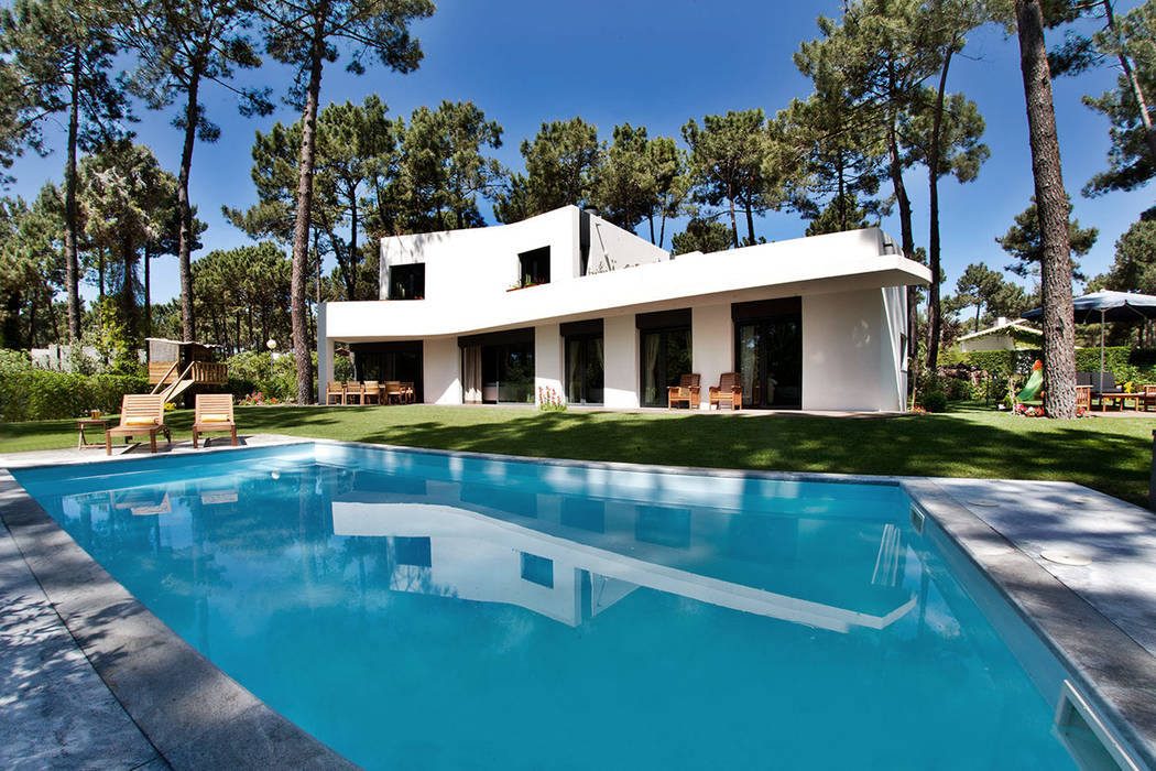 Modern houses by Novostudio Arquitectos Modern