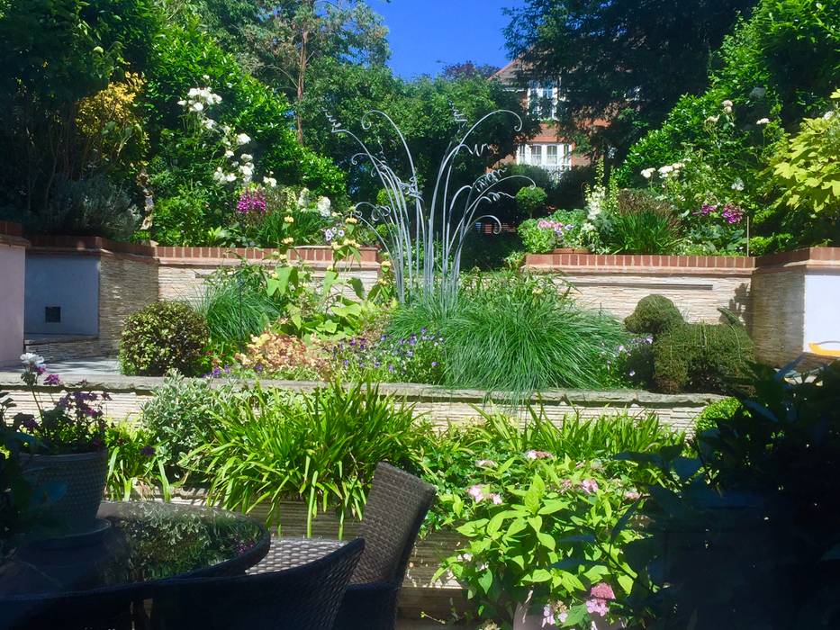 Terraced garden Surrey UK 1 to one garden design Eclectic style garden