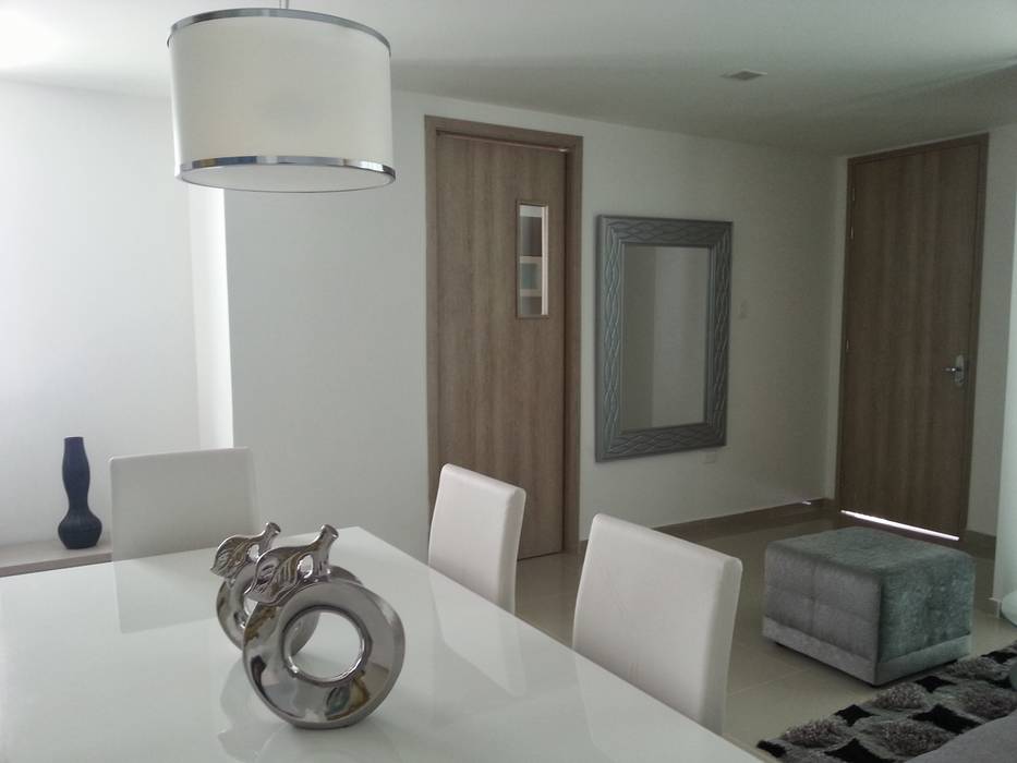 Interior apartamento tipo Oleb Arquitectura & Interiorismo Comedores modernos