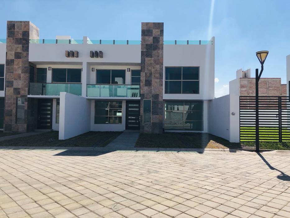 Casa residencial en Tulancingo Navecsa Constructora Casas de estilo minimalista Ladrillos