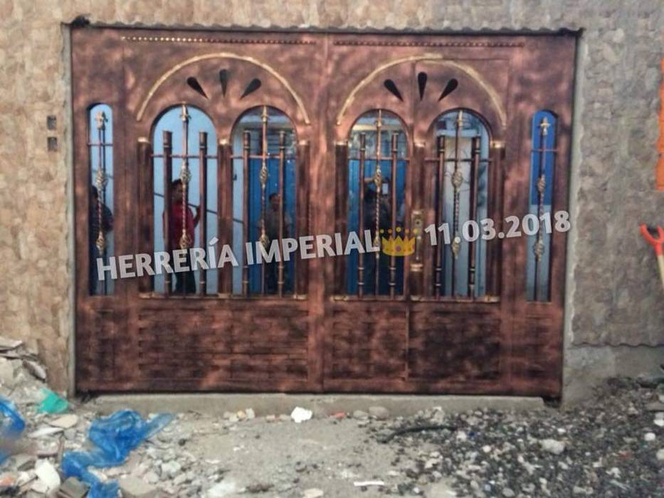 Portones Coloniales., Herreria y Aluminio Imperial Herreria y Aluminio Imperial Garage Doors Iron/Steel