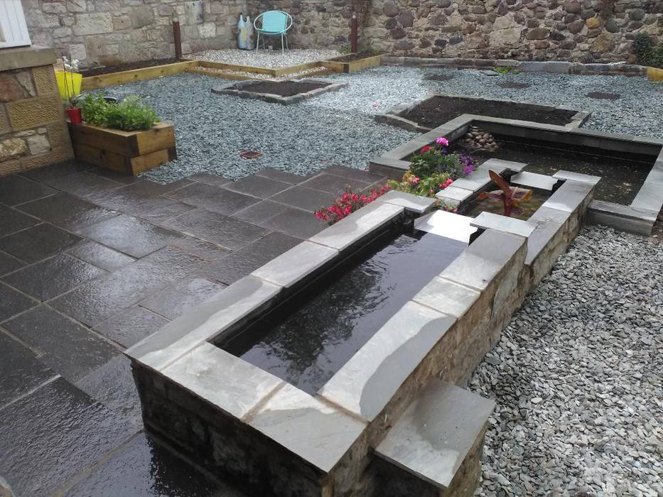 A raised pond. Colinton Gardening Services - garden landscaping for Edinburgh بركة مائية garden design Edinburgh