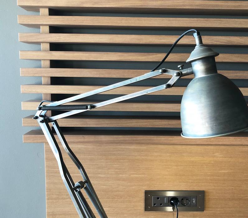 Detail. Solid wood shelving and sleek brushed stainless steel plug point cover plate. Turquoise