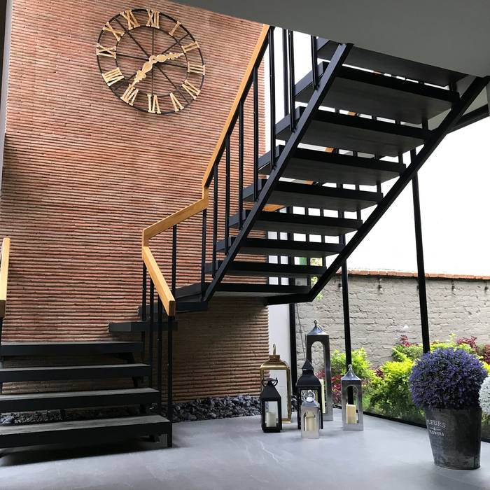 escalera Arq Gabriel Tellez Casas de estilo moderno