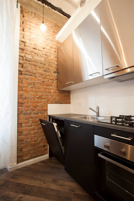 NOT ANOTHER BRICK IN THE WALL, GruppoTre Architetti GruppoTre Architetti Cocinas de estilo moderno