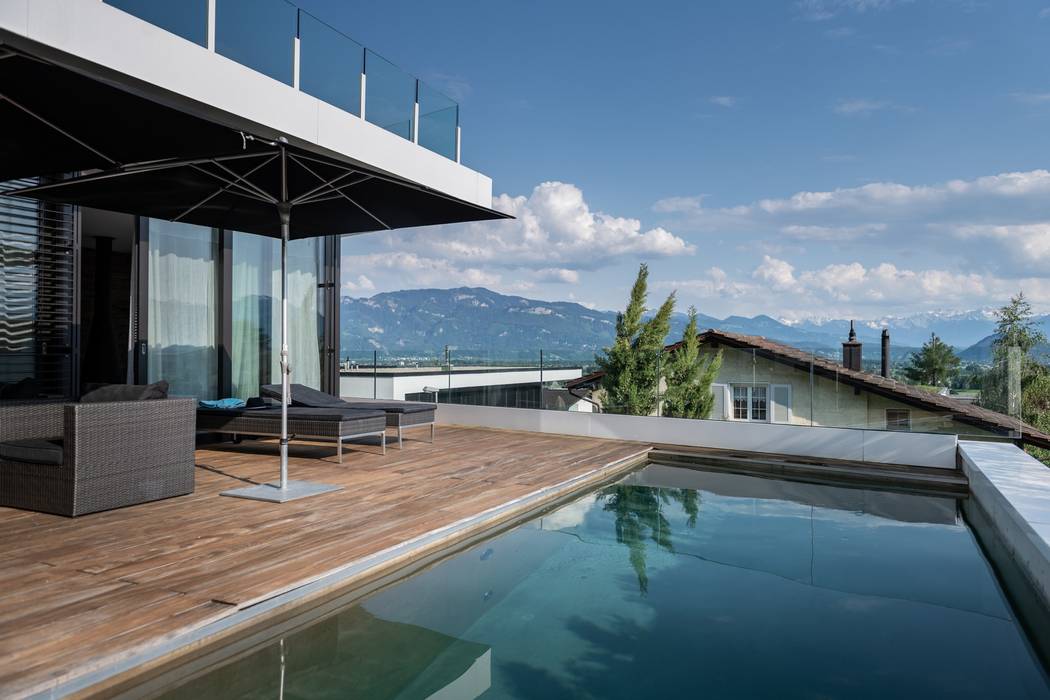 Architektenhaus in der Schweiz am Weinhang, Avantecture GmbH Avantecture GmbH Modern Pool