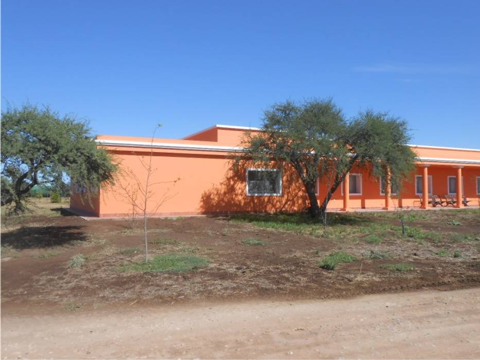 Habitaciones para cabaña agrícola en General Acha, La Pampa, Dario Basaldella Arquitectura Dario Basaldella Arquitectura Country house Bricks