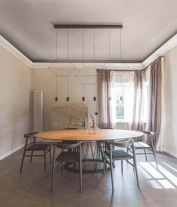 A+V Family House, MODO Architettura MODO Architettura Modern dining room