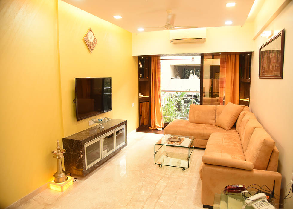 The Quaint Living Room - Tan Sofas, Textured wall, italian marbled tv unit, inhouse furniture, onyx lamp stands, for this residence. we bascically opened up the space with color and textures.. made it more lively. Ornate Projects Living room Marble