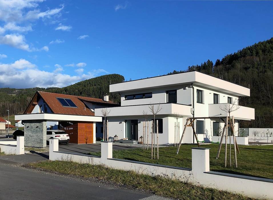 Südwestfassade archipur Architekten aus Wien Einfamilienhaus Ziegel gedeckter Freibereich, Balkon, modernes Haus