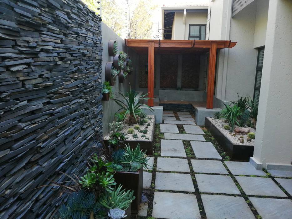 Slate wall cladding, wooden pergola, rusted steel, custom build raised beds, steel wall planters, succulents, seating, modern, contemporary, small garden spaces, small garden ideas, Young Landscape Design Studio Modern Garden Rusted steel planters, Slate wall cladding, wooden pergola, rusted steel, custom build raised beds, steel wall planters, succulents, seating, modern, contemporary, small garden spaces, small garden ideas