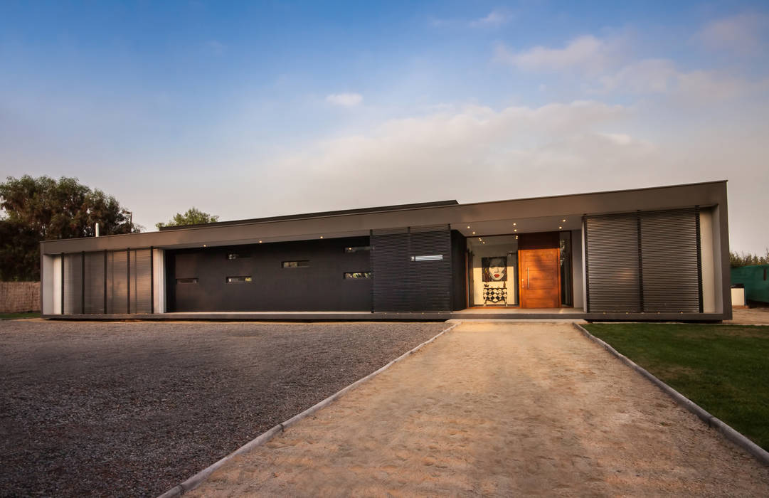 Casa Olguin, JPV Arquitecto JPV Arquitecto Будинки