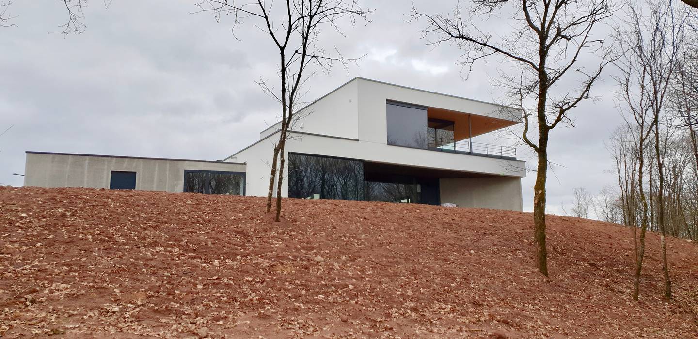 vue ouest du jardin en hiver BIOVILLA Maisons modernes