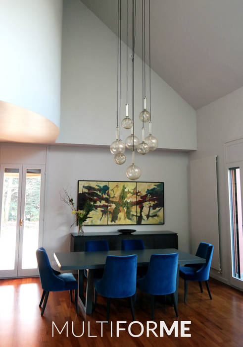 Custom chandeliers in Murano glass for a Private Flat in Milan, Italy, MULTIFORME® lighting MULTIFORME® lighting Modern Living Room Glass Lighting