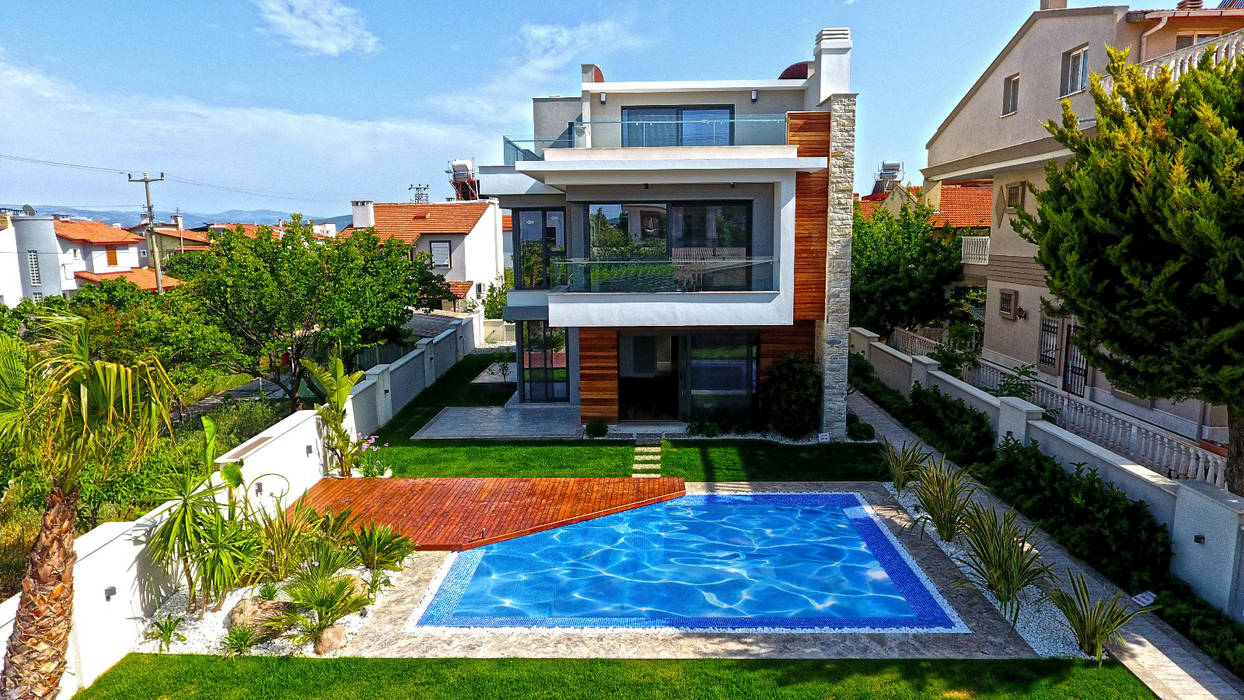 Villa ModURLA, Ata Mimarlık İnş. ve Taah. Tic.Ltd.Şti. Ata Mimarlık İnş. ve Taah. Tic.Ltd.Şti. Jardines en la fachada