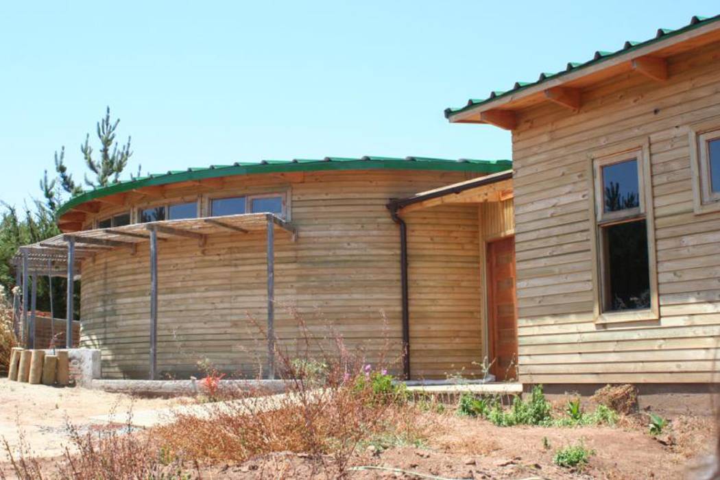 Casa Chauriye, Yunquen, Chile MONAGHAN DESIGN SAS Casas ecológicas Derivados de madera Transparente construcción con madera