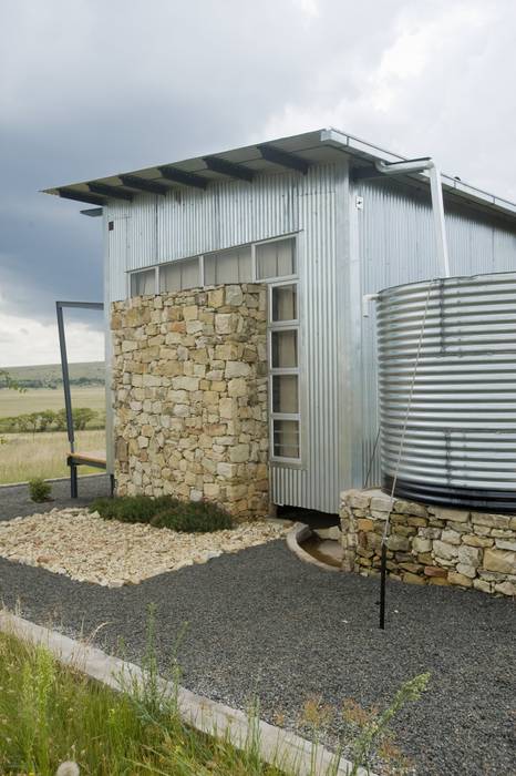 using a selection of materials suited to the landscape and climate LEAF Architects Prefabricated Home Aluminium/Zinc natural stone, climatic design, rainwater harvesting