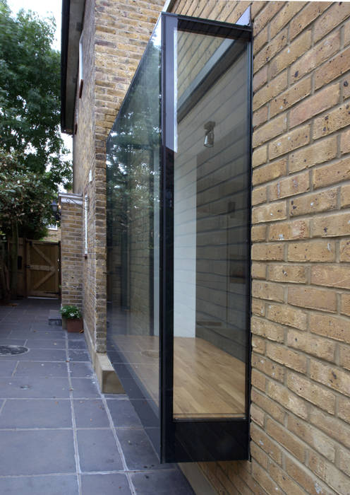 Oriel window MAGRITS Modern Evler rear extension, brick, family house, architect, London, extension, bifolding, oriel window, windows, patio door, bench, modern glazing