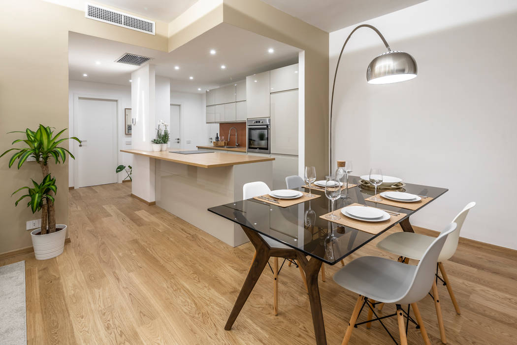 Ristrutturazione completa: Appartamento destinato ad affitti brevi, Architrek Architrek Modern dining room