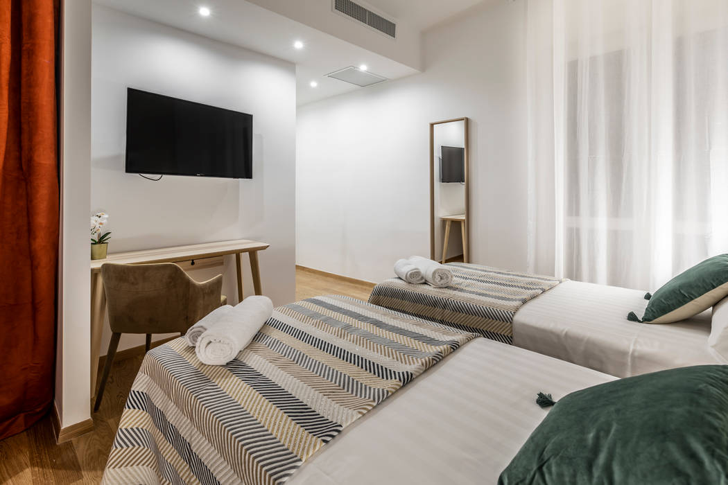 Ristrutturazione completa: Appartamento destinato ad affitti brevi, Architrek Architrek Modern style bedroom