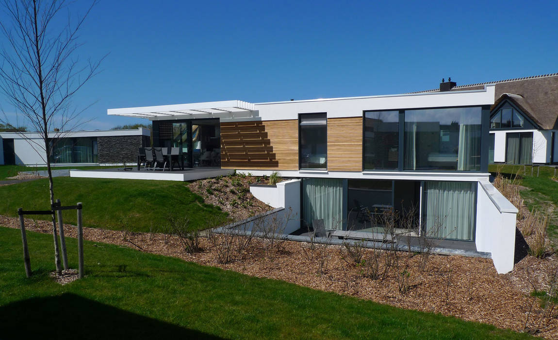 zwembadvilla op Texel, hans moor architects hans moor architects Casas modernas