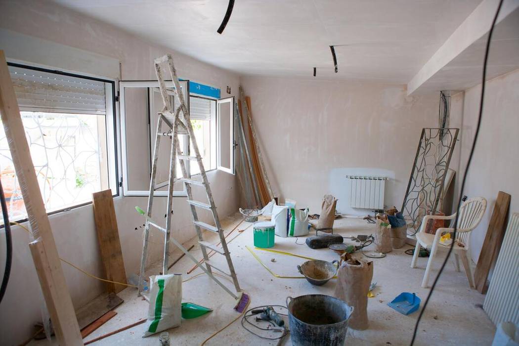 Berta Drywall Pros, Berta Drywall Pros Berta Drywall Pros Living room Property,Wood,Interior design,Lighting,Window,Flooring,Fixture,Floor,Building,Ladder