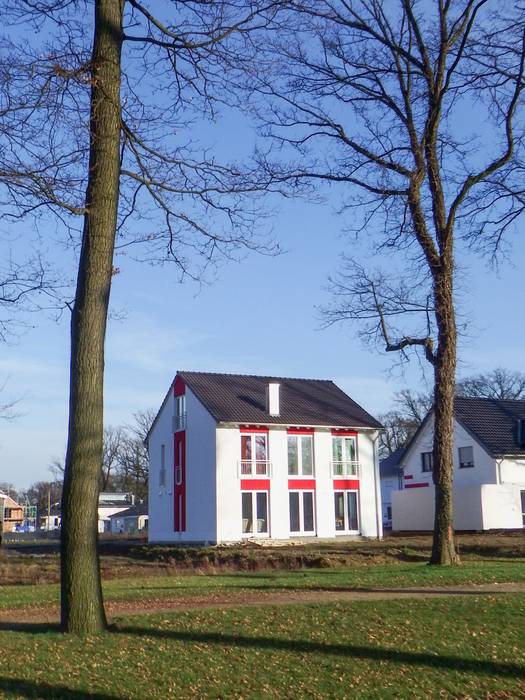 Einfamilienhaus mit Liapor® Massivwänden in Dortmund., F.C. Nüdling Fertigteiltechnik GmbH + Co. KG F.C. Nüdling Fertigteiltechnik GmbH + Co. KG Rumah prefabrikasi