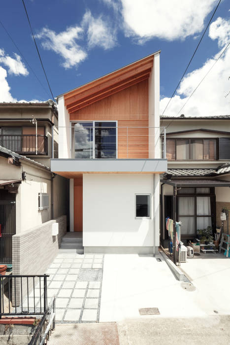 向日市の家/house of muko city, STUDIO RAKKORA ARCHITECTS STUDIO RAKKORA ARCHITECTS Casas de estilo moderno