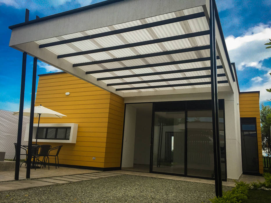 Entrada principal y garaje puertas estilo rural de nacad arquitectos