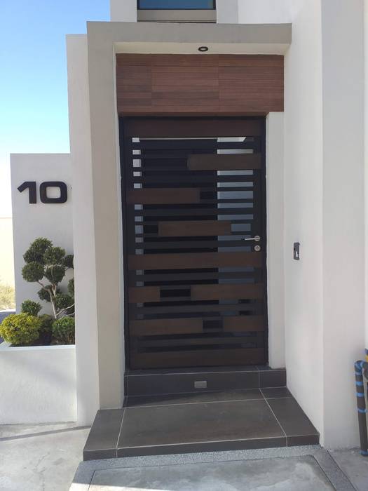 Residencia MO Monterrey Nuevo Le´ón, Mevisa Construcciones Mevisa Construcciones Modern style doors