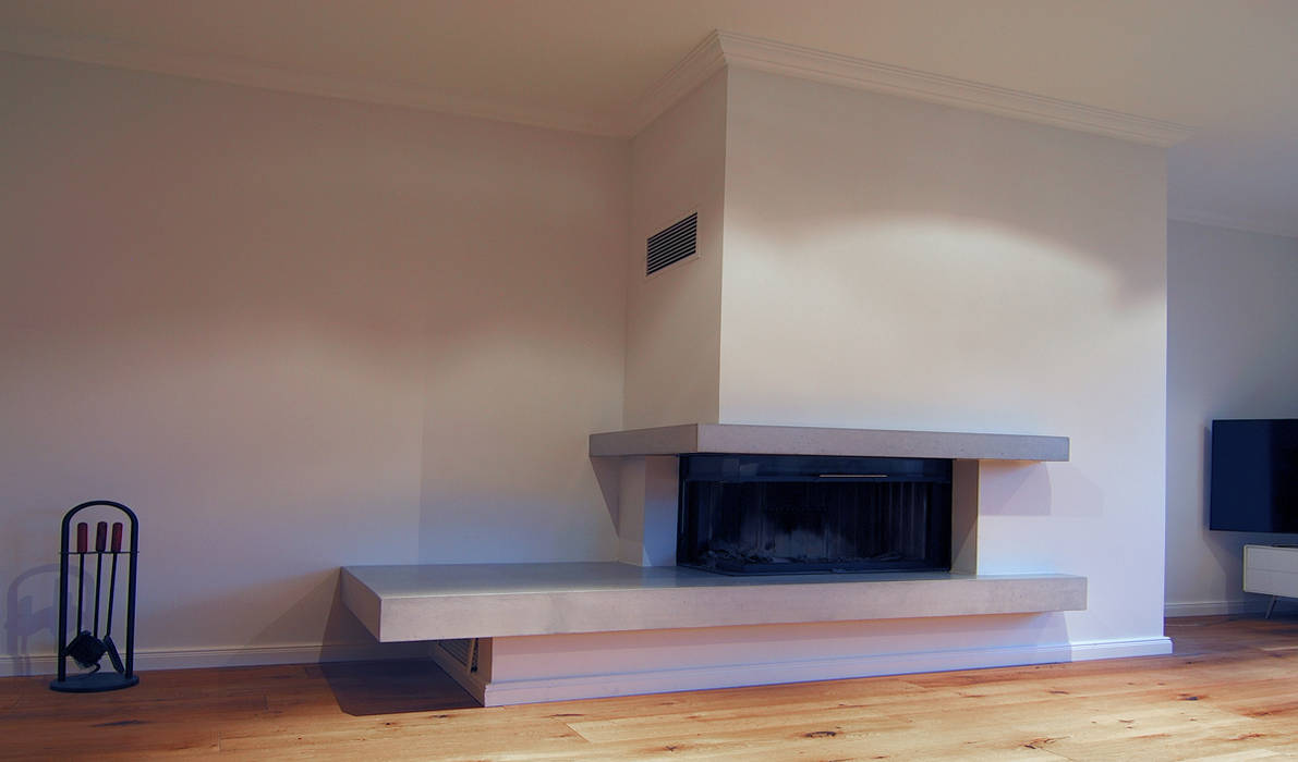Betonkamine – Wärme im Beton, material raum form material raum form Living room Concrete