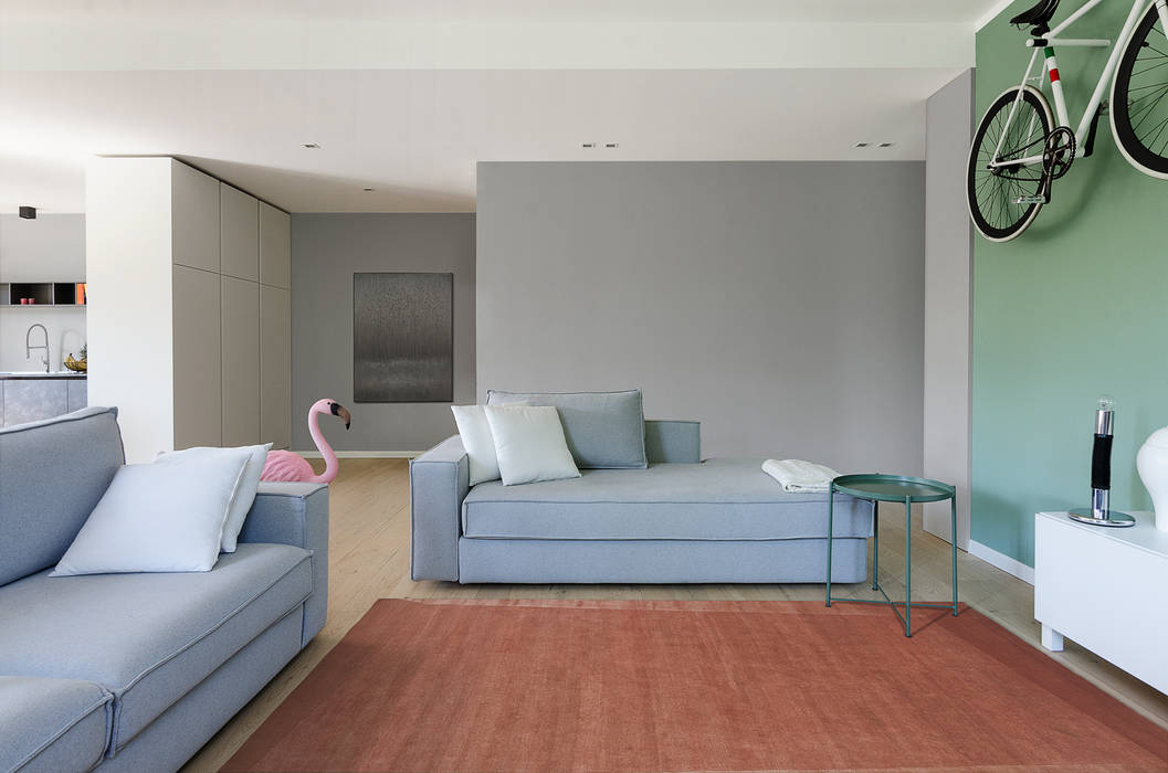 Appartamento T - soggiorno locatelli pepato Soggiorno moderno Legno Effetto legno appartamento loft open space minimal moderno legno pareti grigio grigie divani divano chaise longue day bed tappeto tavolino