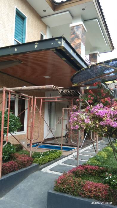 Rumah GGI, Alfaiz Design Alfaiz Design Dach płaski Plastik
