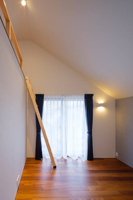明大前の賃貸併用二世帯住宅 設計事務所アーキプレイス 北欧スタイルの 寝室 綿 赤色 テキスタイル