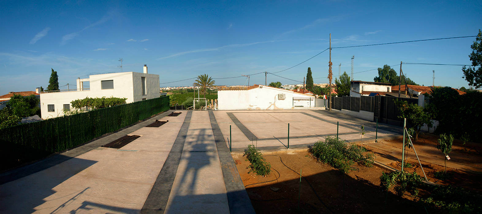 Pavimentación con hormigón impreso del exterior 2 Ignacio Tarazón arquitectura/architecte Balcones y terrazas de estilo minimalista Hormigón