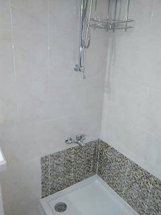 Remoção de uma banheira, Canoarte, Lda Canoarte, Lda Modern bathroom Tiles