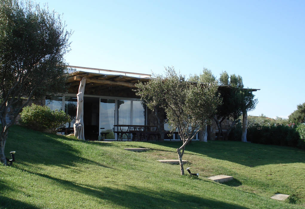 Villa con vista , Eikon Eikon Jardins de fachada Pedra