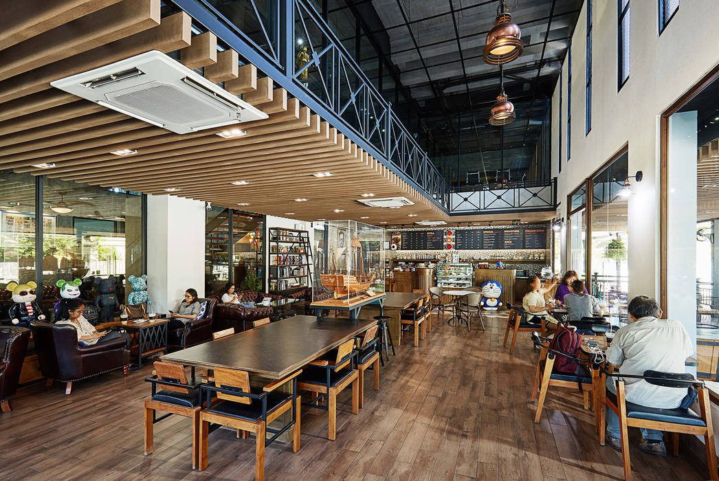 The M Cafe Phutthabucha, Modernize Design + Turnkey Modernize Design + Turnkey Modern dining room
