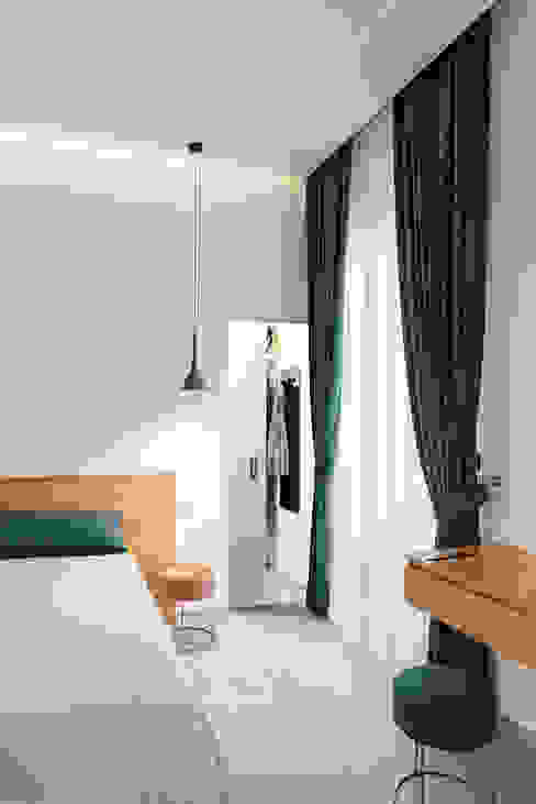 Camera Padronale manuarino architettura design comunicazione Camera da letto piccola Legno Blu letto,cabina armadio