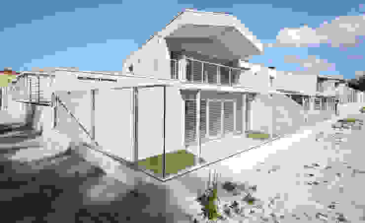 house studio: living workshop francesco valentini architetto Будинки
